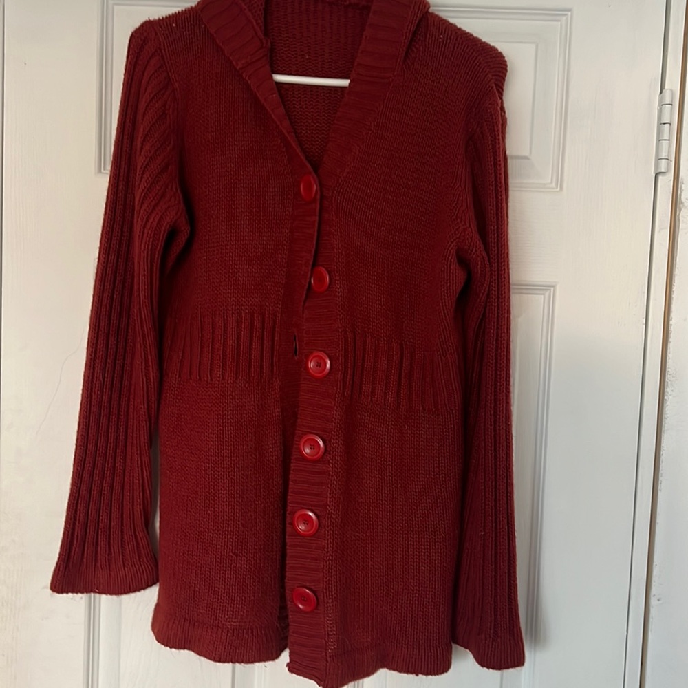 Knit long sleeved hooded sweater